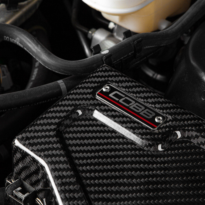 Cobb Tuning Redline Carbon Fibre Fuse Cover - Subaru WRX 08-21/STI 08-21