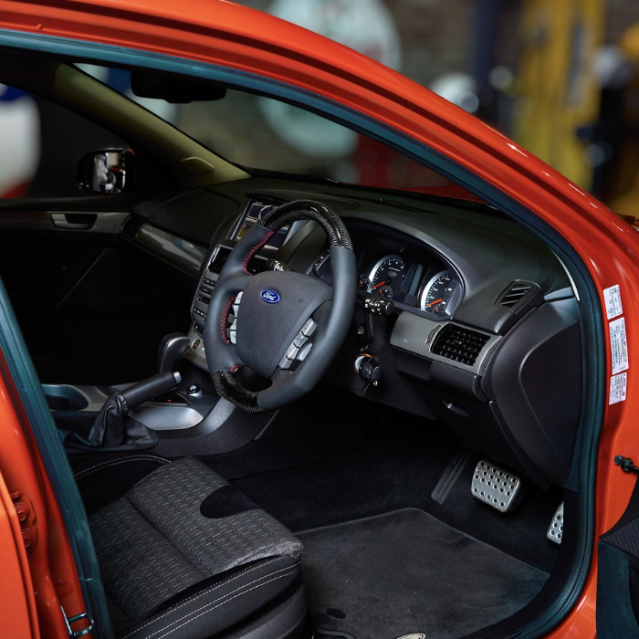 Retro Ford/FPV FG Falcon Steering Wheel Black Leather Red Stitching Carbon Fibre Flat Bottom FG-FB-RED-ST-CF