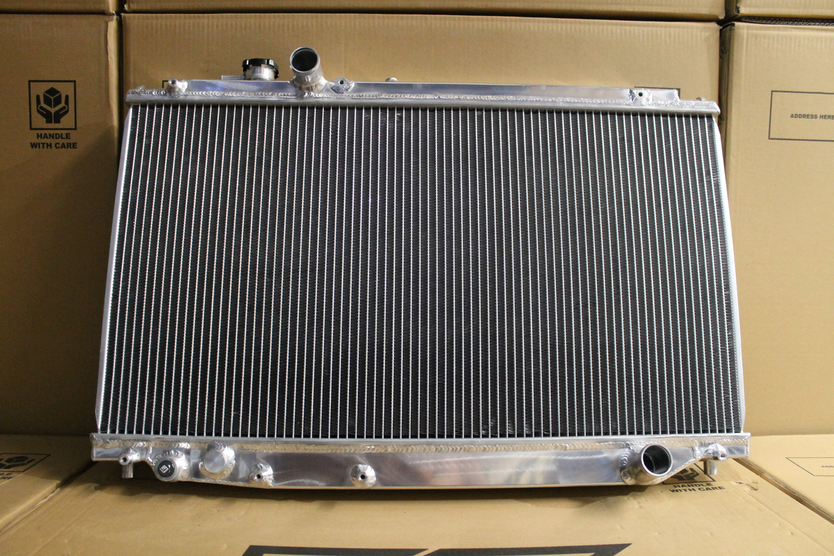 Toyota Supra JZA80 Full Alloy Performance Radiator & Fan Shroud Kit – polished radiator reverse view – original Fenix photograph