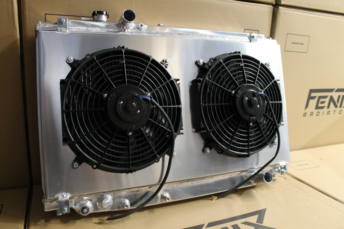 Toyota Supra JZA80 Full Alloy Performance Radiator & Fan Shroud Kit – polished radiator and twin fan kit angled view – original Fenix photograph