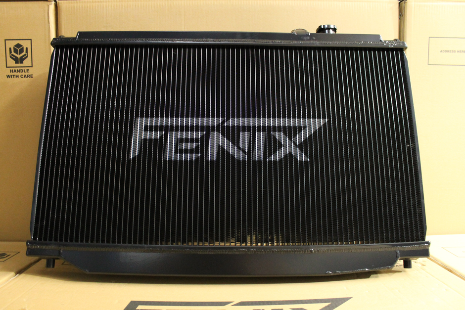 Toyota Supra JZA80 Full Alloy Performance Radiator & Fan Shroud Kit – satin black radiator Fenix core logo view – original Fenix photograph