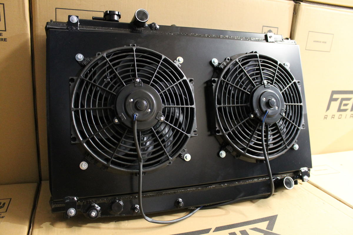 Toyota Supra JZA80 Full Alloy Performance Radiator & Fan Shroud Kit – satin black radiator and twin fan kit angled view – original Fenix photograph